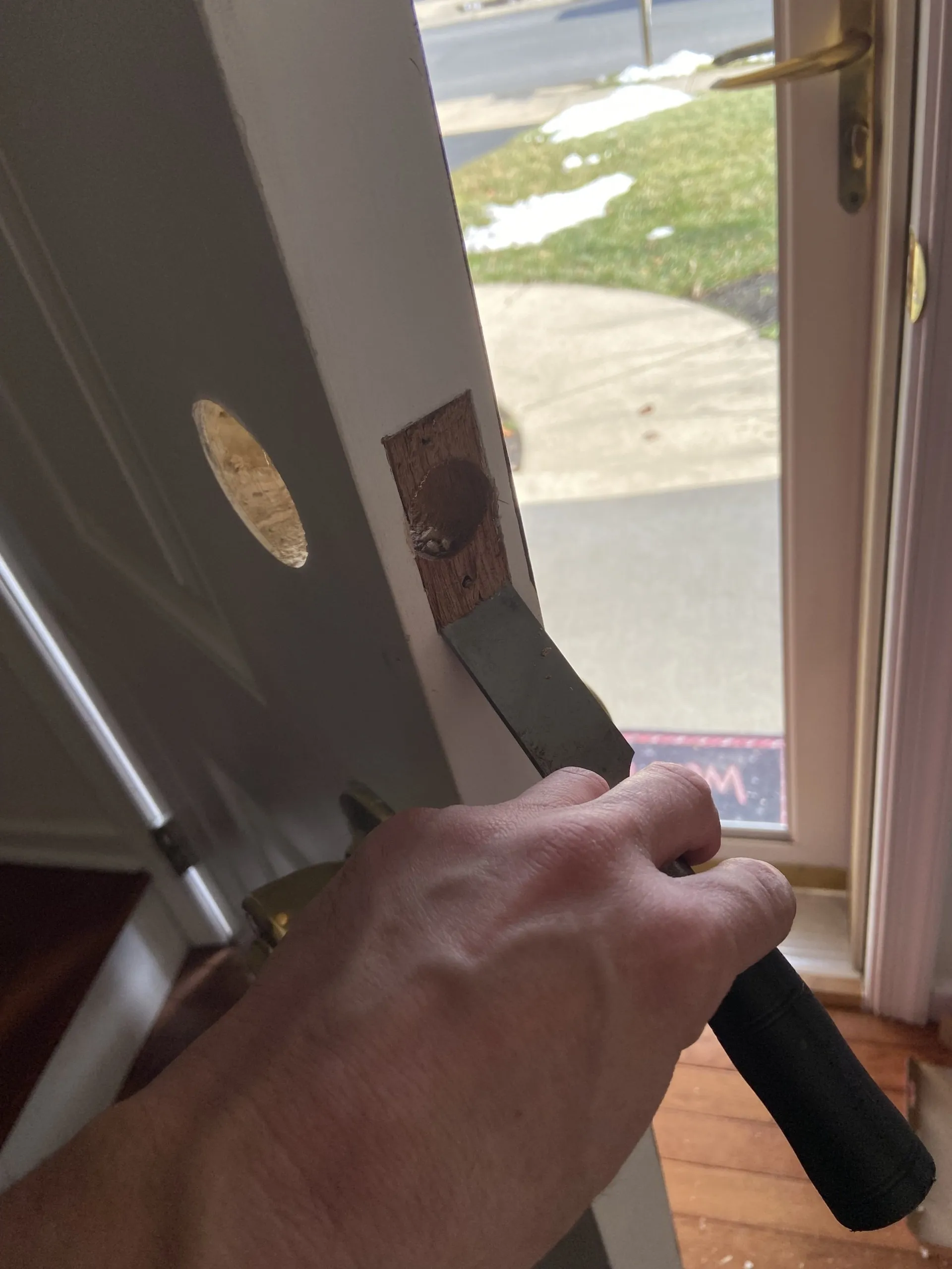 Drilling and prepping door for new deadbolt installation